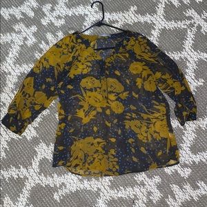 Floral blouse with buttons . Light weight .